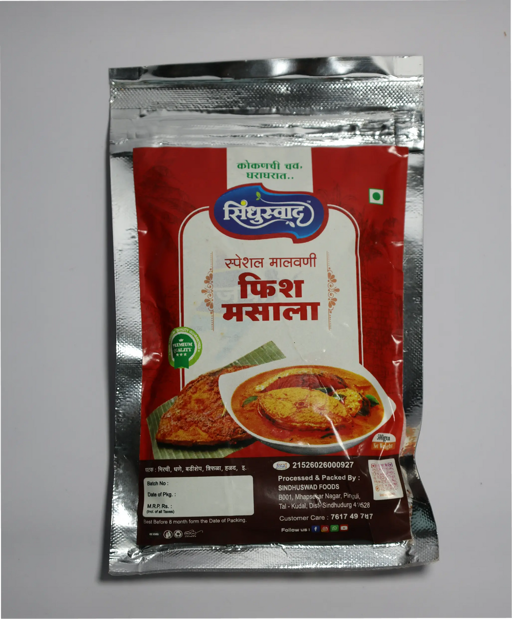 A close-up of premium reddish-brown Sindhuswad Malwani fish curry masala powder in a traditional rustic bowl
