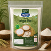 A stand-up pouch of Indian rice flour (Tandul Phalata) on a wooden table with bowls of loose rice flour and grains in the background. The brand 'Safed Krubhal' is visible on the green label.