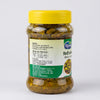 A jar of Sindhuswad Foods  Mirchi spice pickle by Naturals, featuring a bright yellow lid and a green and white label, set against a plain light gray background.