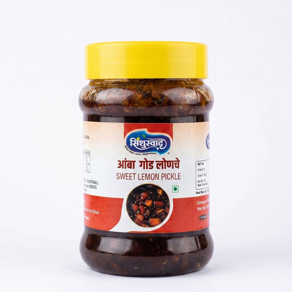 A jar of Sindhuswad Foods Sweet Lemon Pickle with a bright yellow lid and a white and red label, set against a plain white background.